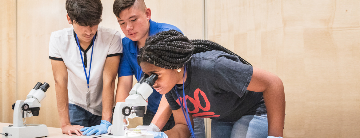 High school students enrolled in lab-based courses for university credit.